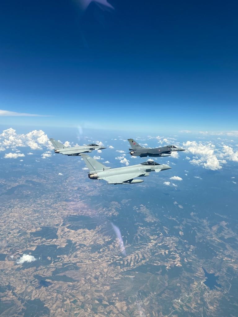 Three Typhoons in flight.